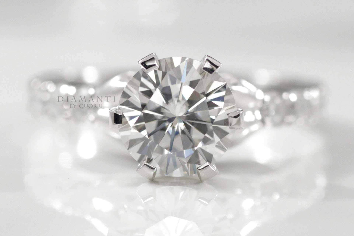 accented round 6 prong solitaire ring