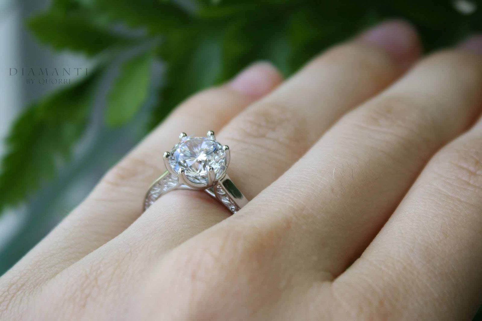 classic designer white gold rose motif 1.5 carat round lab diamond engagement ring at Quorri