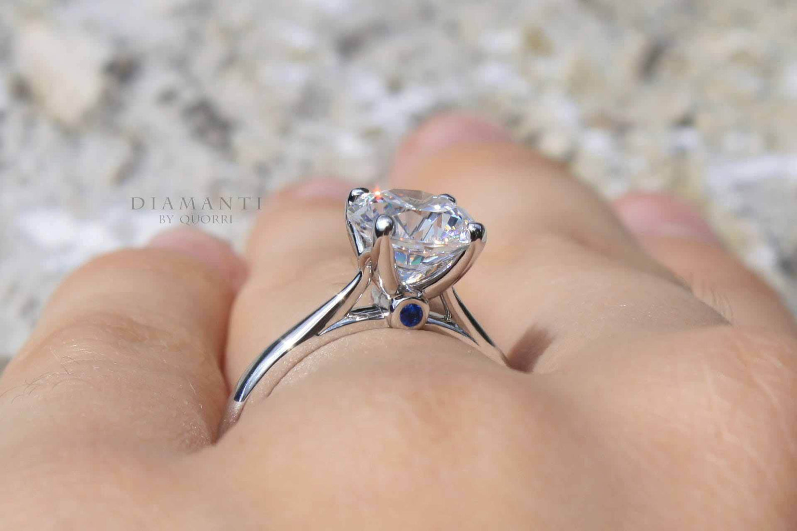 classic designer 14k white gold 1 carat round lab diamond and sapphire engagement ring at Quorri