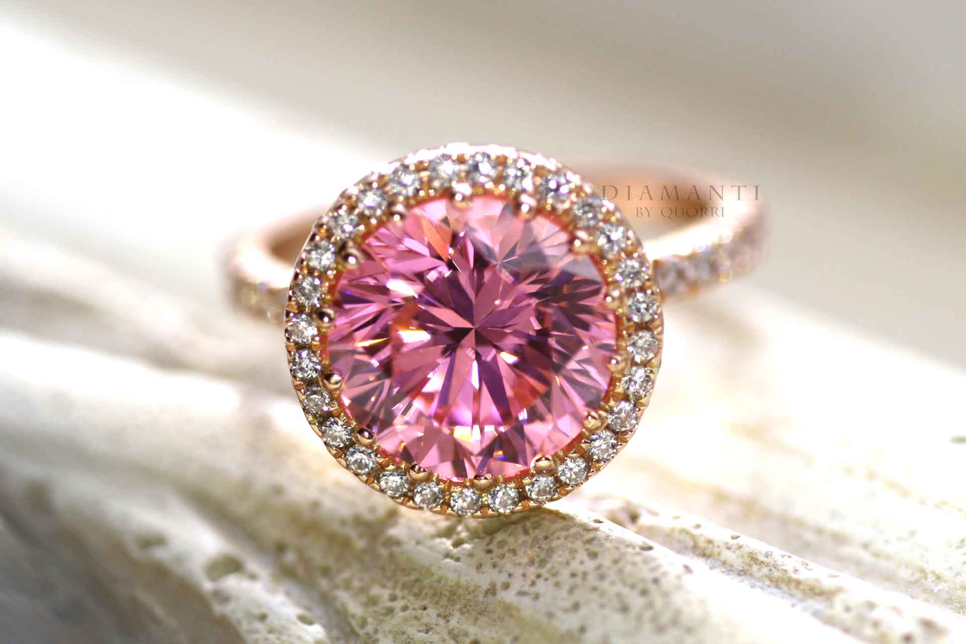 round halo pink cultured sapphire engagement ring