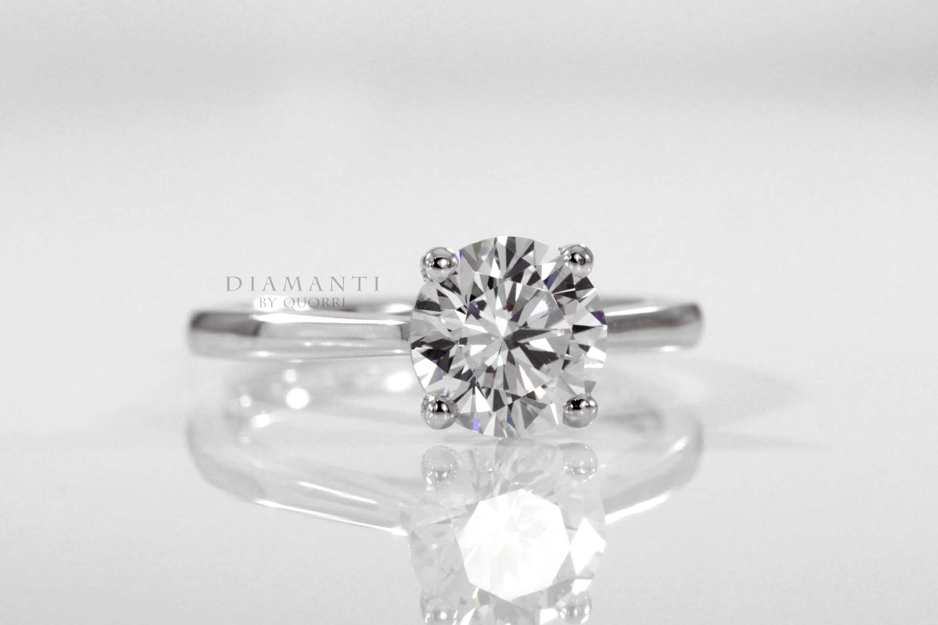 4 prong solitaire engagement ring with round brilliant white gold