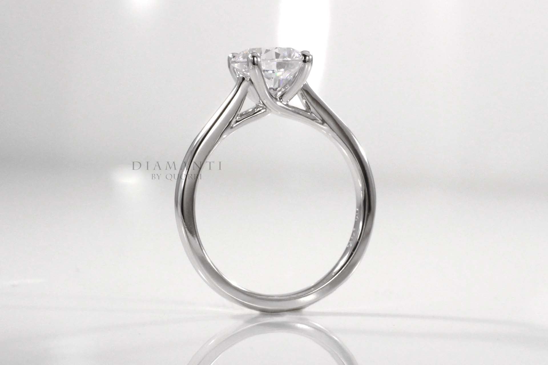 petite diamond solitaire ring in yellow gold made in canada
